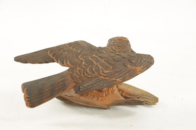 Lot 532 - A JAPANESE MEIJI PERIOD CARVED WOOD OKIMONO OF TWO QUARRELLING HAWKS