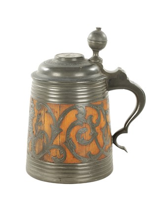 Lot 1101 - A 19TH CENTURY SWEDISH COMMEMORATIVE OAK AND PEWTER TANKARD