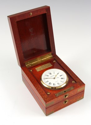 Lot 628 - A LUXOR ELECTRIC DECK WATCH the mahogany brass...