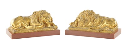 Lot 983 - A PAIR OF LATE 19TH CENTURY GILT BRONZE RECUMBENT LIONS