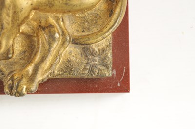 Lot 698 - A PAIR OF LATE 19TH CENTURY GILT BRONZE RECUMBENT LIONS