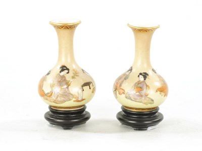 Lot 580 - A PAIR OF FINE JAPANESE MEIJI PERIOD SATSUMA MINIATURE BOTTLE VASES