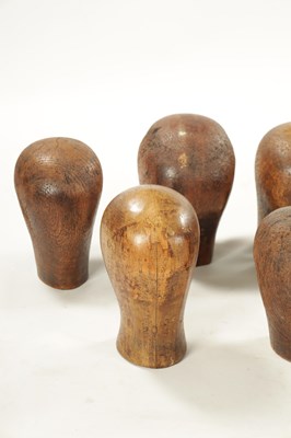 Lot 965 - A COLLECTION OF THIRTEEN 19TH CENTURY WOODEN WIG STANDS