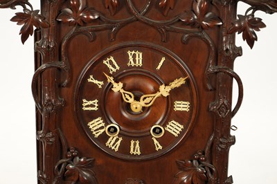 Lot 1201 - A LARGE LATE 19TH CENTURY BLACK FOREST TRUMPETER CLOCK