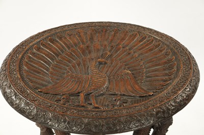 Lot 496 - A 19TH CENTURY INDIAN HARDWOOD OCCASIONAL TABLE
