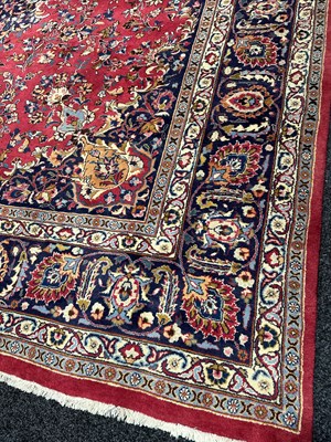 Lot 1460 - A LARGE EASTERN RUG