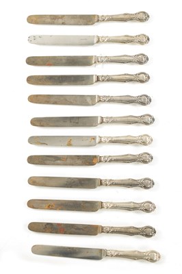 Lot 739 - A SET OF TWELVE VICTORIAN SILVER-HANDLED TABLE KNIVES