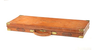 Lot 808 - A LATE 19TH CENTURY BRASS BOUND LEATHER SHOTGUN CASE BY BOSS AND C0.