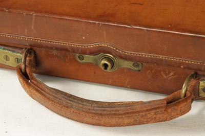 Lot 808 - A LATE 19TH CENTURY BRASS BOUND LEATHER SHOTGUN CASE BY BOSS AND C0.