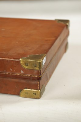 Lot 808 - A LATE 19TH CENTURY BRASS BOUND LEATHER SHOTGUN CASE BY BOSS AND C0.