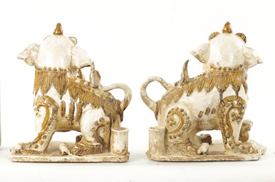 Lot 495 - A PAIR OF 19TH CENTURY CHINESE CERAMIC FOO DOGS