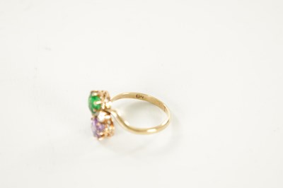 Lot 346 - A LADIES 9CT GOLD AMATHYST AND EMERALD RING