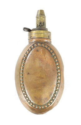 Lot 621 - A 19TH CENTURY COPPER AND BRASS POWDER FLASK