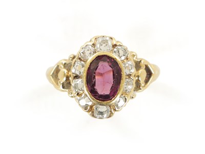 Lot 352 - A LADIES VINTAGE 18CT GOLD AMETHYST AND DIAMOND RING
