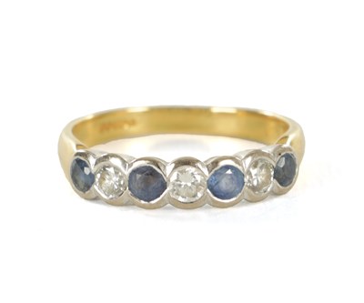 Lot 279 - A LADIES 18CT GOLD FIVE STONE SAPPHIRE AND DIAMOND RING