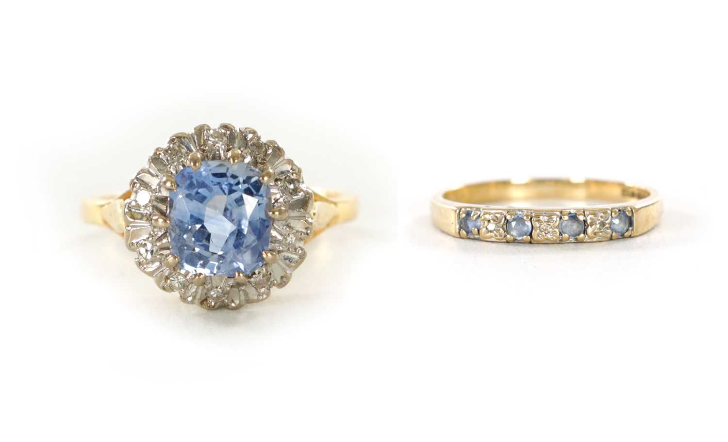 Lot 312 - AN 18CT GOLD SAPPHIRE AND DIAMOND RING AND 9CT GOLD SEVEN STONE RING