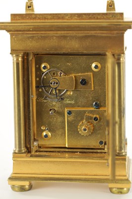 Lot A FINE MID 19TH CENTURY ENGLISH GILT ENGRAVED FUSEE CARRIAGE CLOCK