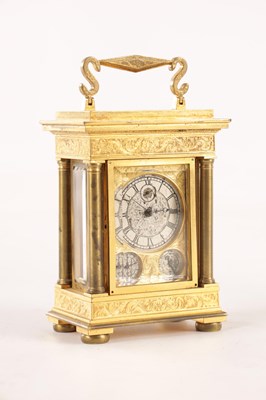 Lot A FINE MID 19TH CENTURY ENGLISH GILT ENGRAVED FUSEE CARRIAGE CLOCK