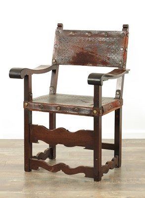 Lot 1429 - A LATE 17TH CENTURY SPANISH WALNUT AND LEATHER ARMCHAIR