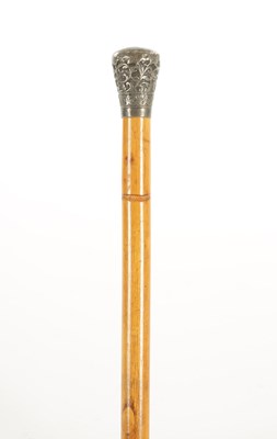 Lot 713 - AN INDIAN SILVER TOPPED BAMBOO WALKING STICK