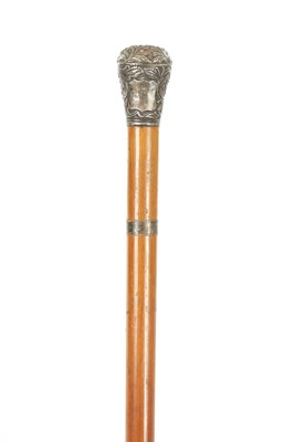 Lot 680 - A LATE 19TH CENTURY INDIAN SILVER TOPPED AND MALACCA WALKING STICK