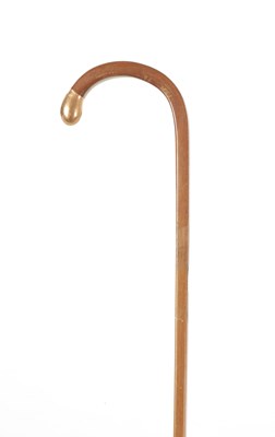 Lot 678 - A SQUARE SHAPED BENT TOP WALKING STICK WITH A .375 9CT GOLD POMMEL