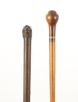 Lot 675 - A 19TH CENTURY CAST LION'S HEAD WALKING CANE