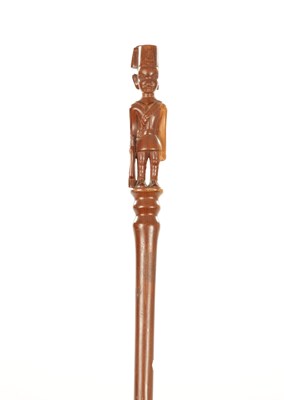 Lot 687 - A 20TH CENTURY CARVED HARDWOOD AFRICAN WALKING STICK