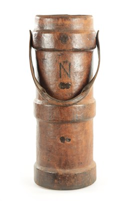 Lot 859 - AN EARLY 20TH CENTURY LEATHER SHELL CARRIER