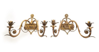 Lot 803 - A PAIR OF ADAM STYLE TWO BRANCH GILT BRASS HANGING WALL LIGHTS