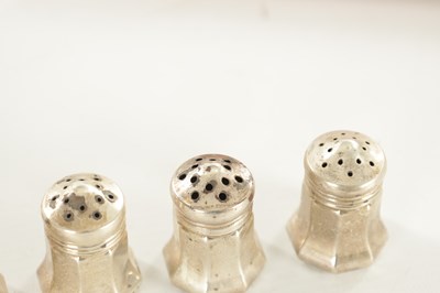 Lot 415 - A CASED SET OF EIGHT CARTIER STERLING SILVER SALTS