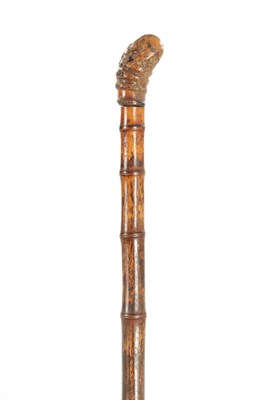 Lot 699 - A 19TH CENTURY BAMBOO HORSE MEASURING STICK