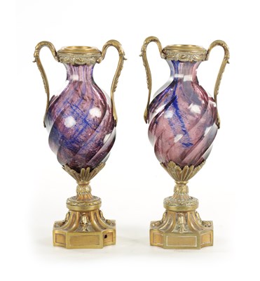 Lot 934 - A PAIR OF 19TH CENTURY RUSSIAN DORE ORMOLU MOUNTED AMETHYST CRYSTAL GLASS URNS