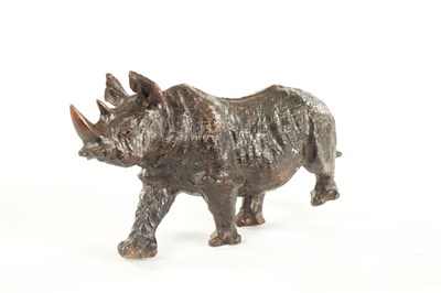 Lot 1320 - A 19TH CENTURY ROOTWOOD CARVING OF A RHINOCEROS