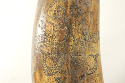 Lot 620 - A LATE GEORGE III SCRIMSHAW-WORK HORN POWDER FLASK