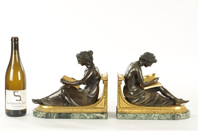 Lot 802 - A PAIR OF 19TH CENTURY FRENCH PATINATED AND GILT BRONZE BOOKENDS