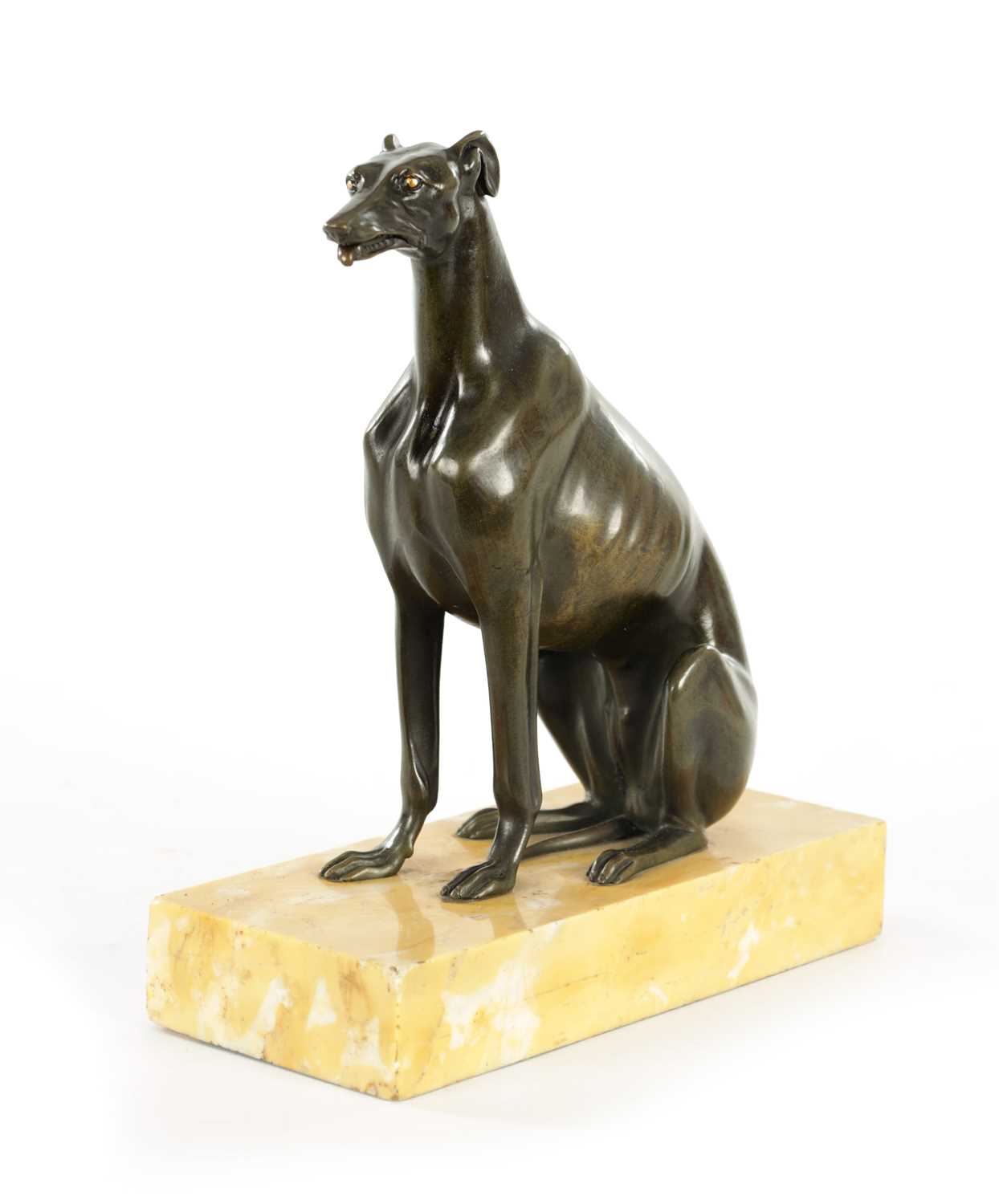 Lot 617 - A REGENCY PATINATED BRONZE DESK TIDY FORMED AS A SEATED GREY HOUND