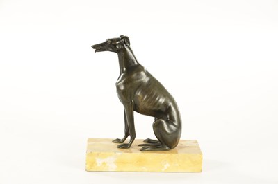 Lot 617 - A REGENCY PATINATED BRONZE DESK TIDY FORMED AS A SEATED GREY HOUND