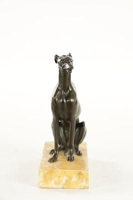 Lot 617 - A REGENCY PATINATED BRONZE DESK TIDY FORMED AS A SEATED GREY HOUND