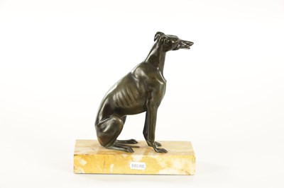 Lot 617 - A REGENCY PATINATED BRONZE DESK TIDY FORMED AS A SEATED GREY HOUND