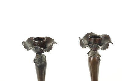 Lot 212 - A FINE PAIR OF JAPANESE MEIJI PATINATED BRONZE FIGURAL CANDLESTICKS