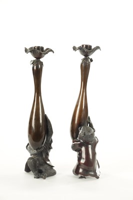 Lot 212 - A FINE PAIR OF JAPANESE MEIJI PATINATED BRONZE FIGURAL CANDLESTICKS
