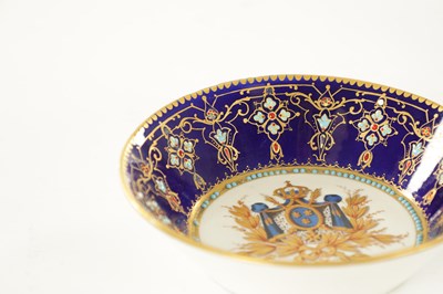 Lot 83 - A FINE 18TH CENTURY SEVRES GILT AND ROYAL BLUE GROUND PORTRAIT CUP AND SAUCER