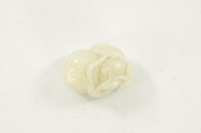 Lot 113 - A 19TH CENTURY CHINESE CARVED WHITE JADE SCULPTURE OF A POMEGRANATE