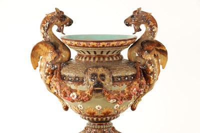 Lot 74 - A 19TH CENTURY CONTINENTAL MAJOLICA JARDINIERE ON STAND BY WILHELM SCHILLER & SONS