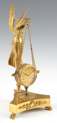 Lot 688 - A LATE 19TH CENTURY FRENCH GILT ORMOLU EMPIRE...