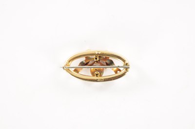 Lot 284 - A 15CT GOLD AND DIAMOND OVAL SHAPED SWEETHEART BROOCH