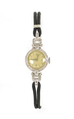 Lot 359 - A LADIES 1930’S WHITE GOLD AND DIAMOND SET COCKTAIL WATCH