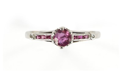 Lot 388 - AN 18CT WHITE GOLD RUBY AND DIAMOND RING.