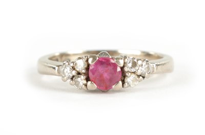 Lot 301 - AN 18CT WHITE GOLD DIAMOND AND RUBY RING
